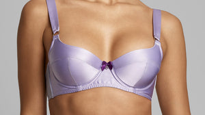 Close up of a woman wearing the Wisteria Silk Bra
