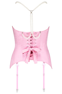 Pink corset with white bows, pearl detailing, and suspender straps from behind