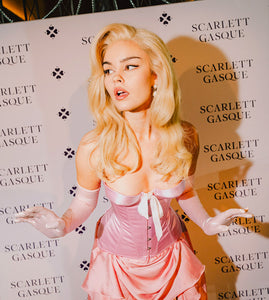 Model on the red carpet wearing a Scarlett Gasque Pearl Basque Corset
